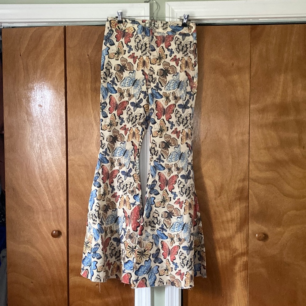 We the Free Butterfly Print Flare Jeans